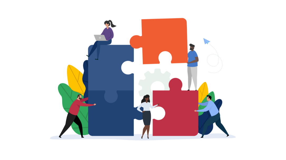 Several people connecting puzzle pieces, representing translation and interpretation partnerships